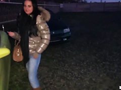 A young girl is offered cash for sex in a lot