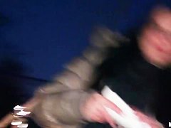A young girl is offered cash for sex in a lot