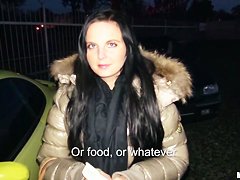 A young girl is offered cash for sex in a lot