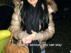 A young girl is offered cash for sex in a lot