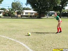 Molly Cavalli and Tiffany Tyler play football