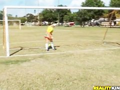 Molly Cavalli and Tiffany Tyler play football