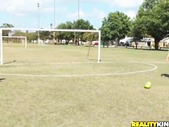 Molly Cavalli and Tiffany Tyler play football