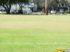 Molly Cavalli and Tiffany Tyler play football