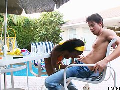 Sexy black babe Desiree in desires sucking dick outdoors