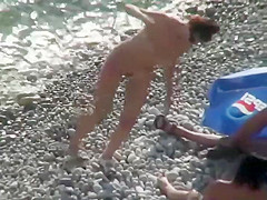 Nudists spied on the beach