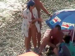 Nudists spied on the beach