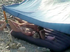 Nudists spied on the beach