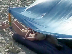 Nudists spied on the beach
