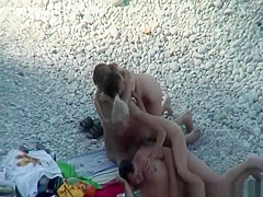 Nudists swimming in the beach