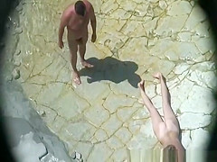 Nude woman with small tits and trimmed pussy