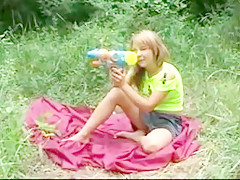 Lovely girl plays outside