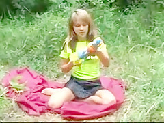 Lovely girl plays outside