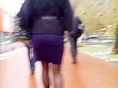 Ass in tight skirt outdoor