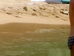 Sexy girl bathing in the sea