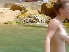 Sexy girl bathing in the sea