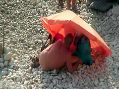Pussy licking on a beach