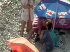 Pussy licking on a beach