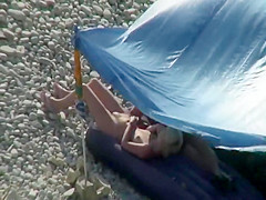 Pussy licking on a beach