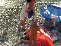 Pussy licking on a beach