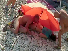 Pussy licking on a beach