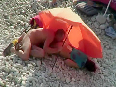 Pussy licking on a beach