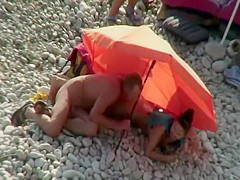 Pussy licking on a beach