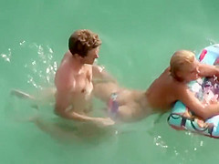 Guy trying to fuck her in the water