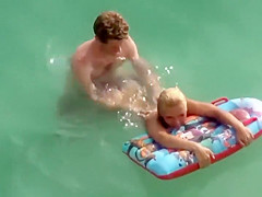 Guy trying to fuck her in the water