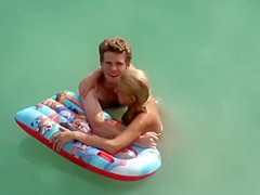 Guy trying to fuck her in the water