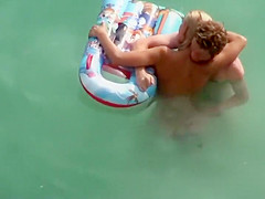 Guy trying to fuck her in the water