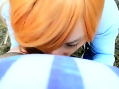 Cute redhead giving blowjob in the woods