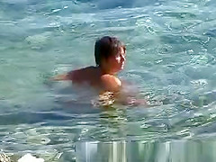 Naked on public beach