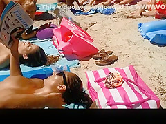 Three hot nudists sunbathing