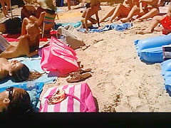 Three hot nudists sunbathing