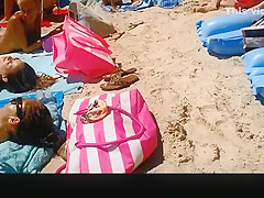 Three hot nudists sunbathing