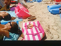 Three hot nudists sunbathing