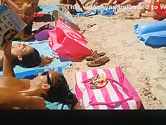 Three hot nudists sunbathing
