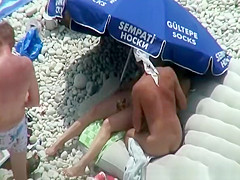 Nude woman preparing food