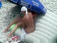 Nude woman preparing food