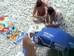 Nude woman preparing food