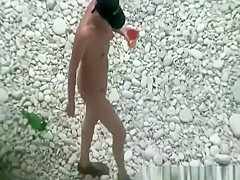 Nude woman preparing food