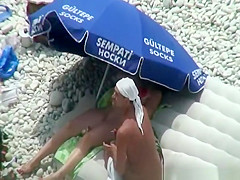 Nude woman preparing food