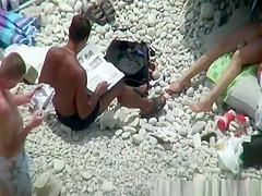 Nude woman preparing food
