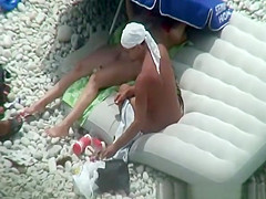 Nude woman preparing food