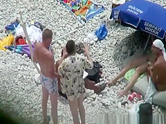 Nude woman preparing food