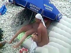 Nude woman preparing food