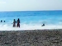 Accidental nudity shown in wavy water