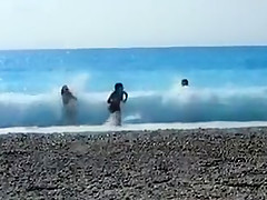 Accidental nudity shown in wavy water