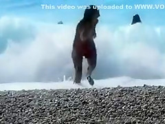 Accidental nudity shown in wavy water